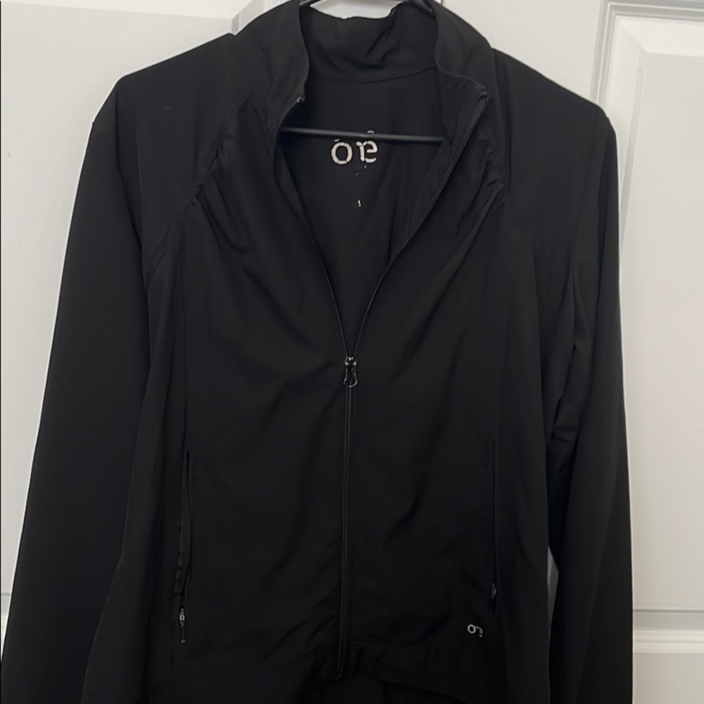 Black zip up running jacket